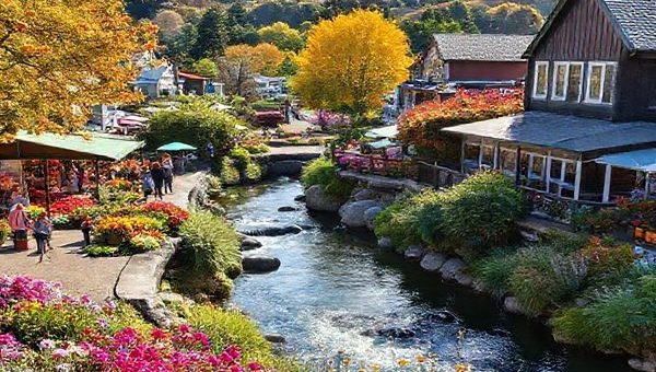 A picturesque scene of Kerikeri, New Zealand, showcasing its lush landscapes and historical charm. Capture the vibrant colors of summer with locals enjoying the Farmer’s Market, surrounded by blooming gardens and the iconic Stone Store glistening under the sun. Include rainbow-hued flowers and a serene river, while artists create amid the lively atmosphere. Alternatively, depict the tranquil beauty of autumn with golden leaves cascading along the Heritage Bypass Walkway, or a misty morning at Aroha Island, where birdwatchers quietly observe native birds. Illustrate the seasonal magic that draws travelers year-round.