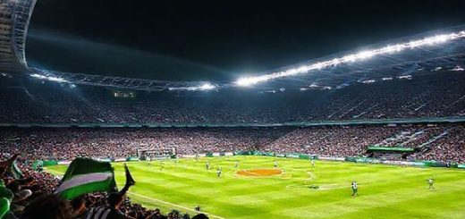 A vibrant football stadium under dazzling floodlights sets the scene for an epic clash between Ludogorets and PAOK. Capture the intense atmosphere with fans waving flags, players in dynamic action, showcasing quick transitions and strategic formations. Highlight Ludogorets' youthful flair against PAOK's resilient defense, all with an electric vibe in high definition.