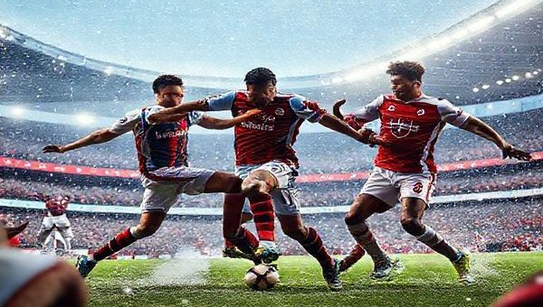 A high-definition image depicting a dramatic clash between Aston Villa and Arsenal at Villa Park in December 2025, showcasing two teams in intense competition. The scene captures the vibrant energy of the match, with Aston Villa's Jacob Ramsey and Ollie Watkins dynamically advancing, while Arsenal's Bukayo Saka and Gabriel Jesus strategically position themselves to defend. Surrounding them are passionate fans in a packed stadium, with a chill winter atmosphere, clear skies, and the warmth of stadium lights illuminating the tension of this pivotal Premier League showdown.