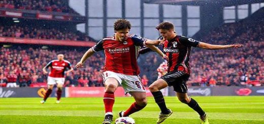 A vibrant and dynamic scene depicting the intense soccer match between Hearts and Kilmarnock at Tynecastle Park in December 2025. Capture the electrifying atmosphere with passionate fans in the stands, colorful team jerseys, and the players in action—Hearts executing a rapid attacking play against Kilmarnock’s organized defense. Emphasize the contrasting styles with Hearts' youthful vigor and Kilmarnock's disciplined approach, showcasing intricate movements and a tense moment of anticipation. Make the image in high definition.