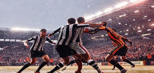 High definition image of a dramatic football match scene under a snowy Scottish sky, featuring the St Mirren team in their traditional black and white stripes, fiercely defending against the vibrant orange and black of Dundee United as players clash in a strategic midfield battle. The iconic Paisley stadium is packed with passionate fans, flags waving, and a chilly atmosphere that enhances the intensity of the game. Bright stadium lights illuminate the pitch, capturing the tension and excitement of a critical Scottish Premiership fixture in December 2025.