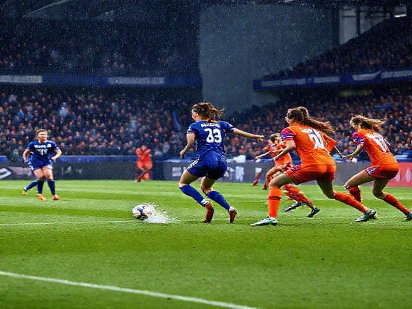 A dramatic high-definition scene of a Women's Super League match between Chelsea Women and Everton Women in December 2025, showcasing intense gameplay on a rain-soaked pitch. The Chelsea team, in their iconic blue kits, is executing a fast-paced counter-attack, led by a dynamic Sam Kerr, while Everton defenders, clad in vibrant orange, are positioned resolutely, ready to intercept. The stadium is packed with passionate fans cheering, with banners flying high and the atmosphere electric, capturing the essence of a high-stakes showdown.