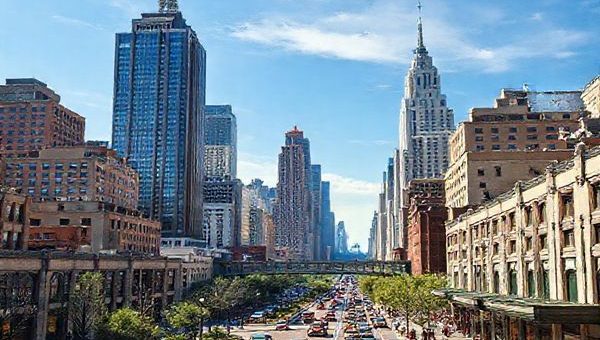 Create a high-definition image of a vibrant 1930s urban skyline, featuring art deco skyscrapers reaching toward a blue sky, bustling cobblestone streets filled with vintage cars, and pedestrians dressed in period fashion. Include elements like lush green parks and intricate pedestrian walkways connecting towering buildings, blending a sense of optimism and modernity. Capture the essence of a futuristic vision as imagined in the 1930s, with a hint of the vibrancy and hope for a harmonious urban future amidst the historical context of the Great Depression.