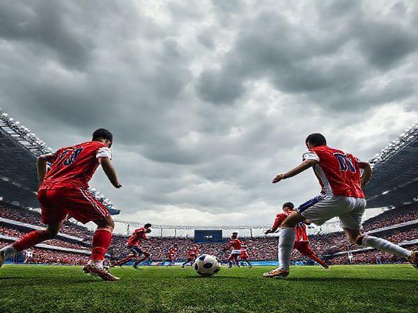Create a high-definition image of a dramatic football match scene set in a stadium under a cloudy sky, showcasing the fierce competition between Gibraltar and Montenegro. Depict Gibraltar's players in a defensive formation, displaying determination and grit, while Montenegro's players are seen pressing forward aggressively, showing flair and intensity. Include a lively crowd in the stands, with flags of both nations waving, capturing the essence of their battle for World Cup qualification.